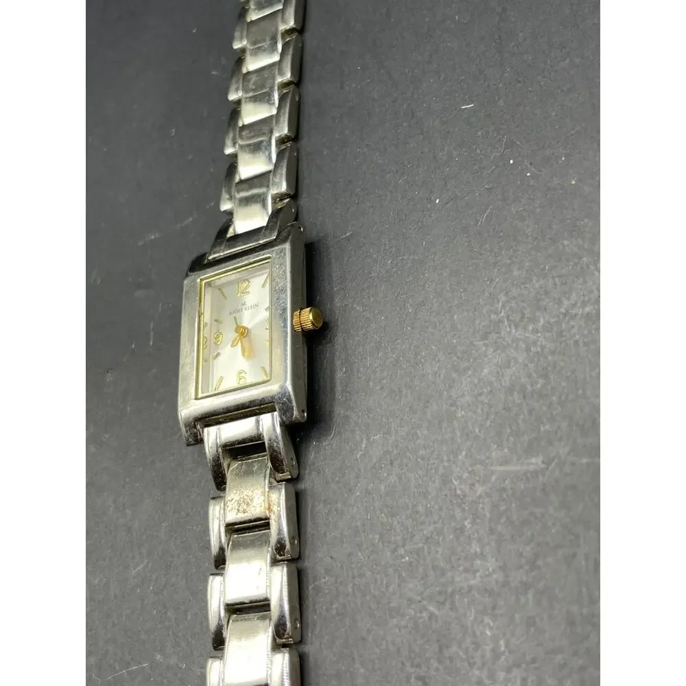 Anne Klein Women's 10/1409 Silver Dial Gold Accented Quartz Watch 21.5mm 6.5